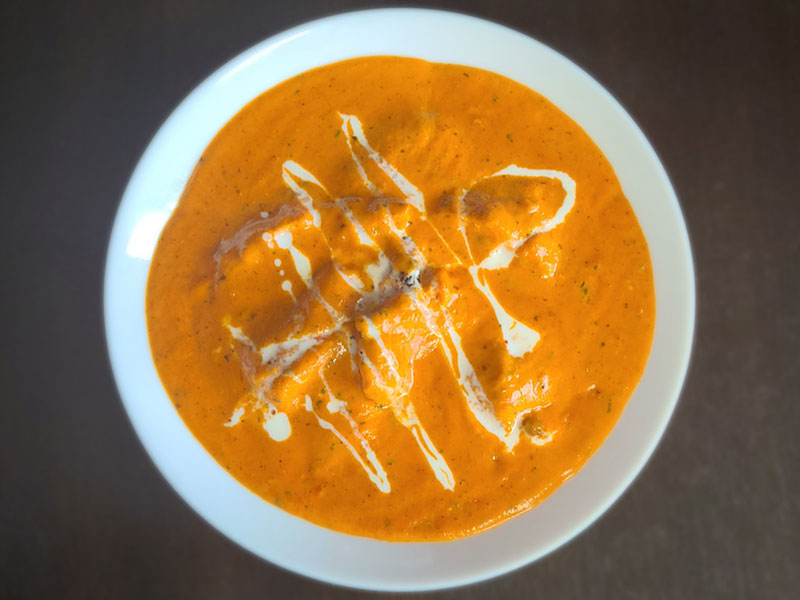 Authentic Butter Chicken with aromatic spices at Aanchal Indian Restaurant & Bakery Griesbach Edmonton